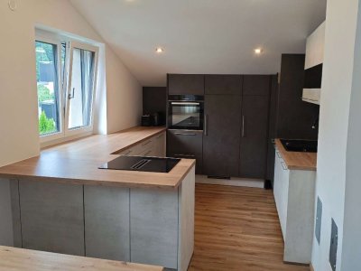 Neu renovierte Wohnung, mit Gartenanteil und optionaler Garage | Erstbezug