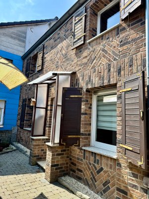Charmantes kleines Haus mit gemütlichem Hof und Garten