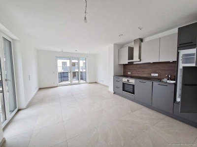 2 Zimmer- Mietwohnung mit Einbauküche in Traunstein. 2 Tiefgaragenstellplätze möglich.