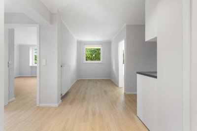 Gepflegte 2,5-Zimmer-Wohnung mit Einbauküche sowie offenen Essbereich und Balkon in Schnelsen