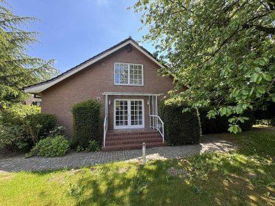 Exclusives Einfamilienhaus mit separater Einliegerwohnung und traumhaftem Garten