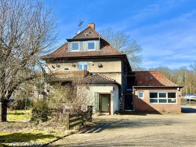 MEHRFAMILIENHAUS MIT GEWERBEANBAU IN HASTE