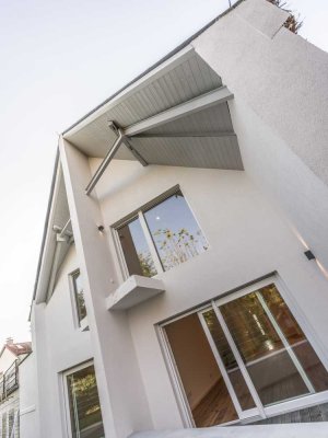 Beeindruckendes Neubau Zweifamilienhaus in beliebter Lage von F-Zeilsheim