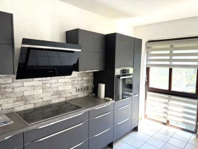 5-Zimmer Maisonette-Eigentumswohnung mit überdachtem Balkon, Einbauküche und Garage
