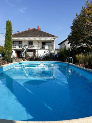 hochwertiges Einfamilienhaus mit Pool und optionalem Baugrundstück!