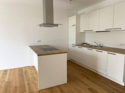 Ruhige Gartenwohnung inkl. Einbauküche und Terrasse - Top H04