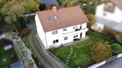 Zwei-Dreifamilienhaus mit großem Grund in guter und ruhiger Lage!