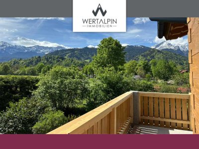 Exklusiver Neubau: 3-Zimmer-Wohnung mit spektakulärem Blick auf das Alpenpanorama! Aufzug, TG