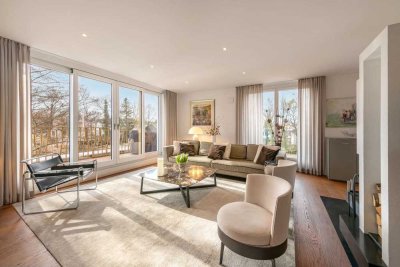 Eleganz und Lichtfülle am Schlosspark: Großzügiges Penthouse mit Kamin und Liftlanding