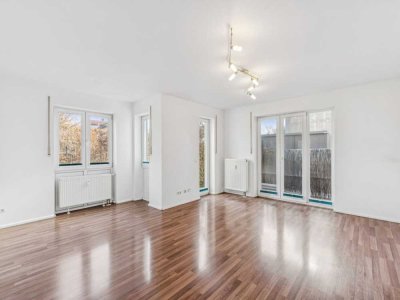 Helle 3-Zimmer-Erdgeschoss-Wohnung mit 60m² Privatgarten sowie Tiefgaragenstellplatz in Moosach