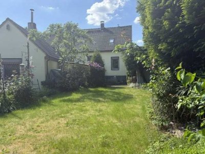Charmantes Einfamilienhaus mit zusätzlicher Fläche im DG mit viel Potential für Ihre individuelle