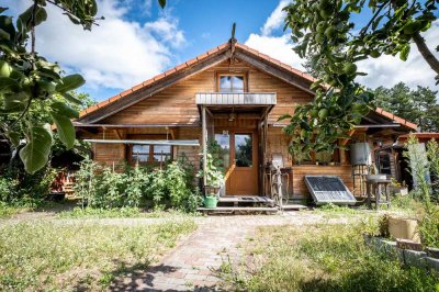 Zur Kapitalanlage: Wohnen in Seenähe - gemütliches Einfamilienhaus auf großzügigem Grundstück