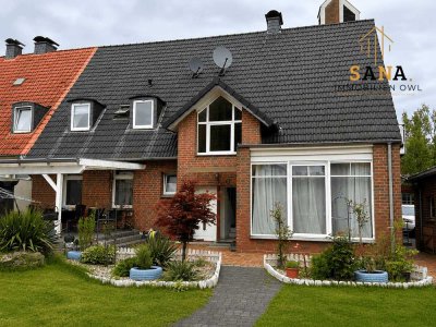 Verklinkerte Doppelhaushälfte mit Ladenlokal in Bielefeld-Senne / Windflöte