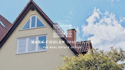 Ein Ort, an dem Erinnerungen wachsen - mit Gartenidylle und Skyline-Blick!