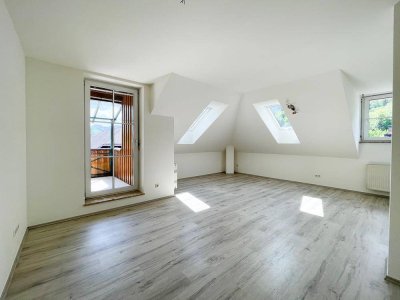 Helle 2 Zi.-Wohnung mit überdachter Terrasse und TG-Stellplatz