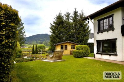 Vielfältige Wohnmöglichkeiten in den Bergen: Mehrfamilienhaus mit Wellness-Garten in Inzell