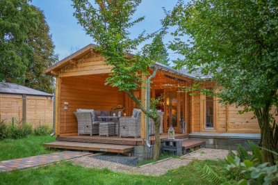 Erholung im Grünen – gemütliches Ferienhaus mit Sauna und Sonnenterrasse bei Döttes