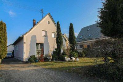 Modernisiertes 6-Zi. EFH mit Garten, Garage, Terrasse & zusätzlichem Baugrundstück in ruhiger Lage