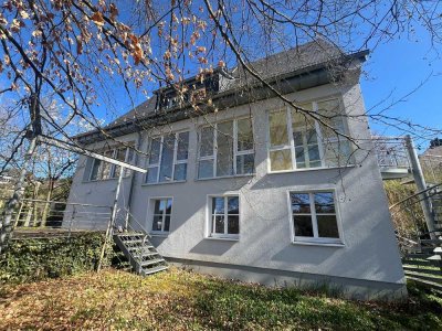 Wohnen & Arbeiten unter einem Dach - Einfamilienhaus mit Gewerbefläche in Toplage