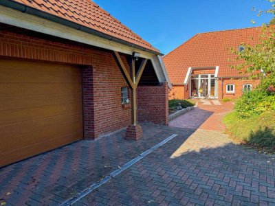 Ebenerdiges Wohnen mit Stil - gemütliches Einfamilienhaus auf großem Grundstück in zweiter Reihe