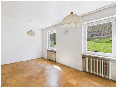 Attraktives Mehrfamilienhaus am Waldrand in naturnaher Lage