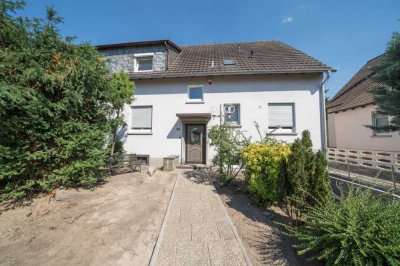 Große Doppelhaushälfte mit 2 separaten Wohnungen im Buchenbusch