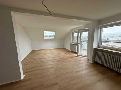 **DG-Wohnung (3 Zimmer) mit Balkon + Stellplatz in Neckarsulm: Erstbezug nach Sanierung**