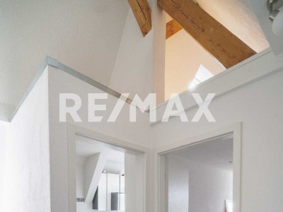 RE/MAX: DIREKT BEZUGSFREI! * Modern geschnittene Maisonettewohnung in zentraler Lage