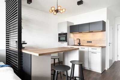 Erstbezug nach Sanierung: modernes Apartment an Top-Adresse Schwabing Leopoldstr. 202!