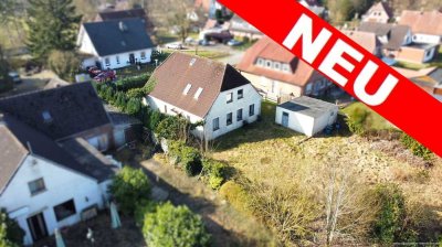 ** Charmantes Einfamilienhaus mit großem Grundstück und Ausbaureserve **