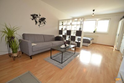 DONAUFELD: Modernes Dachgeschoß-Appartement in zentraler Lage und guter Öffi-Anbindung