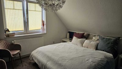 Helle 3,5-Zimmer-Wohnung mit Balkon & ausgebautem Dachgeschoss in Top-Lage