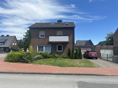 Familienfreundliches Einfamilienhaus mit Einliegerwohnung, Garage  und großen Garten