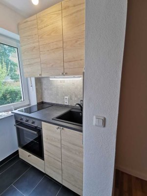 Attraktive 1-Zimmer-EG-Wohnung mit Balkon und EBK in München