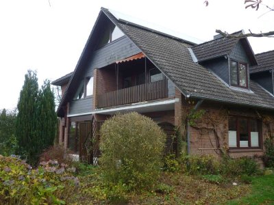 Rosengarten-Tötensen: Moderne, helle und großzügige 2 Zimmer DG-Wohnung mit großer Loggia