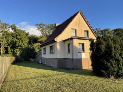 Einfamilienhaus mit geräumigen Ferienhaus und seitlichem Seeblick auf dem Woblitzsee
