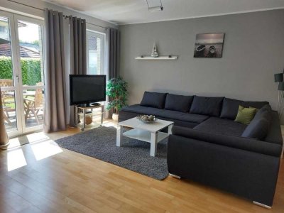 Moderne 2-Zimmer-Wohnung mit Terrasse und Garten
