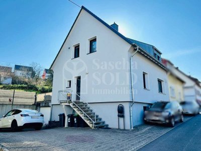 Gepflegtes Einfamilienhaus mit Terrasse, Garten und Garage in Heusweiler - Holz