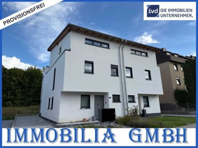 Neubau-Doppelhaushälfte in Zweibrücken: Wohnen am Jacobyberg im modernen Stil mit Garten