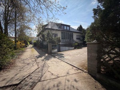 Familienfreundliches Einfamilienhaus mit großem Garten in ruhiger und grüner Lage
