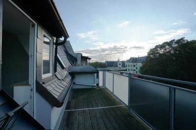 Gemütliche 1-Raum-Dachgeschosswohnung mit Balkon und großer Wohnküche