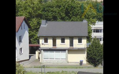 Einfamilienhaus mit 9 Zimmern, 2 Zi Einliegerwohnung und Garten