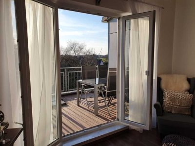 *Hier wohnen Sie gut* 2 Zimmer DG Wohnung mit großer Sonnenterrasse