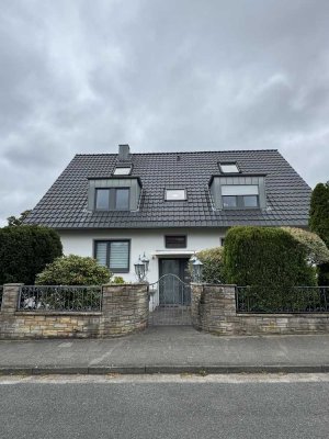 Familienfreundliche Erdgeschosswohnung mit Terrasse und Gartenanteil