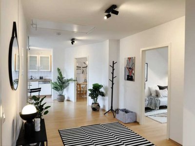 Lichtdurchflutete Dachgeschosswohnung mit historischem Charme und modernem Komfort