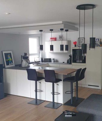 3-Raum-Wohnung mit Balkon, Einbauküche und zwei Tiefgaragenstellplätzen in Bodenheim
