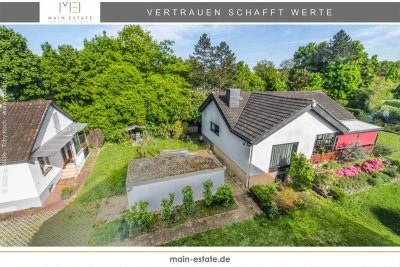 Zwei gepflegte Einfamilienhäuser mit Garage, Stellfläche und großzügigem Garten in Neu-Isenburg