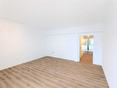 Erstbezug: Moderne 2-Zimmer Erdgeschosswohnung mit Terrasse & Stellplatz
