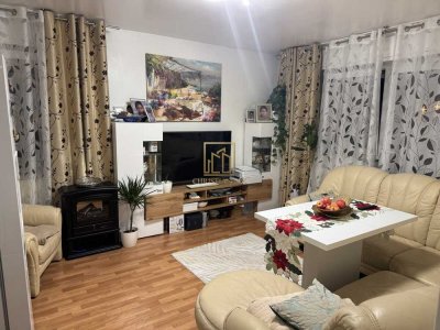 Christian Dik Immobilien/ 4 Zimmer Erdgeschosswohnung mit Balkon in zentraler Lage