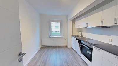Hochwertig sanierte 3-Zi.-Whg. mit Einbauküche und PKW-Stellplatz